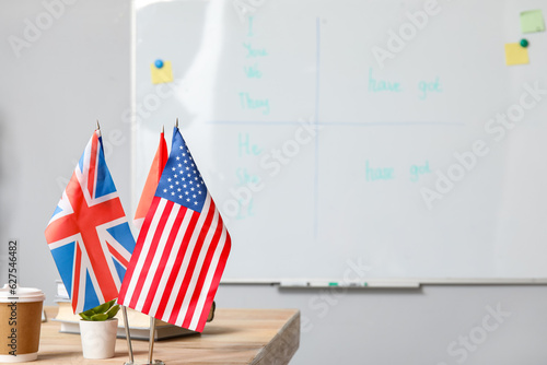 Different flags on table in English classroom, closeup