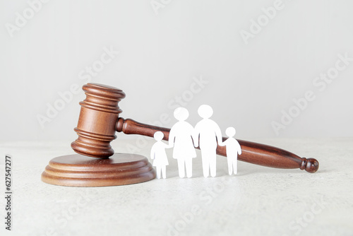 Figures of family with judg...