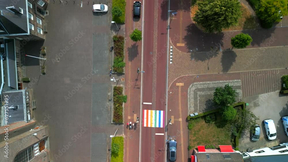 Birds eye view of a rainbow painted crosswalk. Castricum, the Netherlands