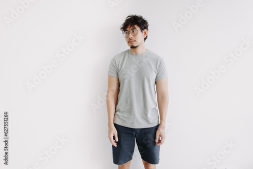 Bored face asian man stand boringly in full body isolated on white.