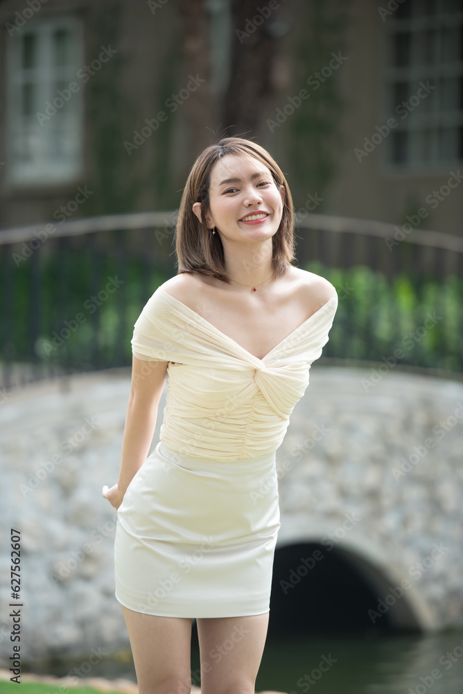 Portrait of young smiling woman looking at camera. happy girl standing in creative office. casual smiling laughing lifestyle of single female, natural look healthy skin and perfect teeth. Portrait of young smiling woman looking at camera. happy girl standing in creative office. casual smiling laughing lifestyle of single female, natural look healthy skin and perfect teeth.