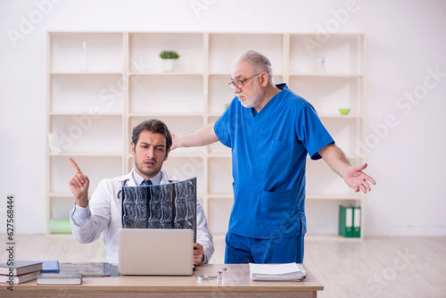Two male doctors radiologists working in the clinic © Elnur