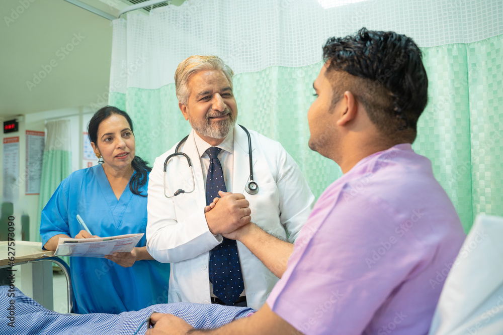 Fototapeta premium Doctor helping and support to patient while medical examination. trust and ethic concept.