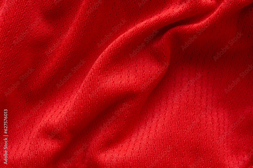 Red sports clothing fabric football shirt jersey texture background Red sports clothing fabric football shirt jersey texture background