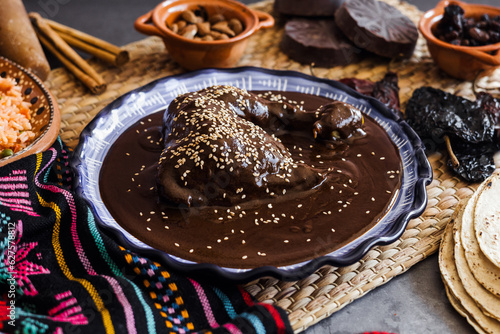 mole poblano is sauce with chicken mexican traditional food in Mexico Latin America photo