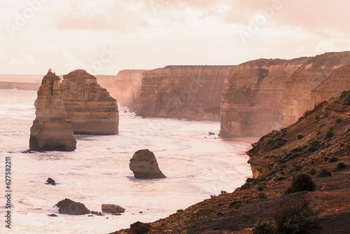 Photograph of the historic and famous 12 Apostles limestone rock stacks along the rugged Great Ocean Road in Victoria in Australia