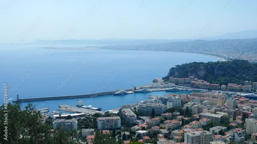 Distant High Angle overlook view of the City Nice, France, and it's Harbour with Luxury Yachts Distant High Angle overlook view of the City Nice, France, and it's Harbour with Luxury Yachts