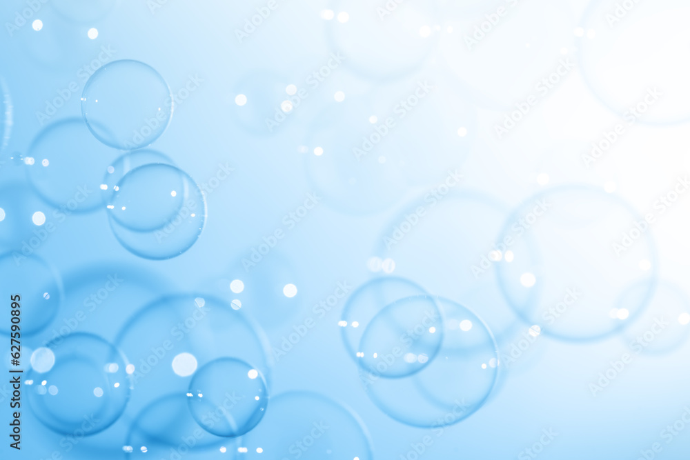 Beautiful Transparent Shiny Blue Soap Bubbles Floating in The Air. Blank White Space, Abstract Fun Background, Blue Gradient Blurred Background, Refreshing of Soap Suds Bubbles Water.