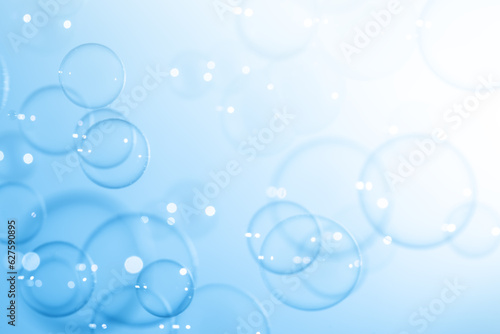 Beautiful Transparent Shiny Blue Soap Bubbles Floating in The Air. Blank White Space, Abstract Fun Background, Blue Gradient Blurred Background, Refreshing of Soap Suds Bubbles Water.