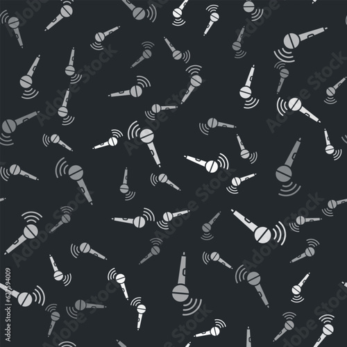 Grey Wireless microphone icon isolated seamless pattern on black background. On air radio mic microphone. Speaker sign. Vector