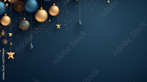 Christmas and New Year minimalistic background. Golden and blue Glass Balls hanging on ribbon on Navy blue background with copy space for text. The concept of Christmas and New Year holidays photo
