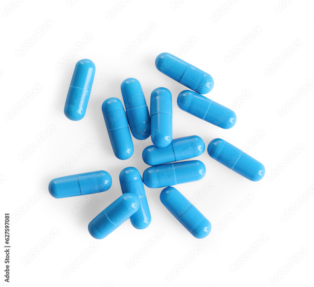 Many light blue pills isolated on white, top view Many light blue pills isolated on white, top view