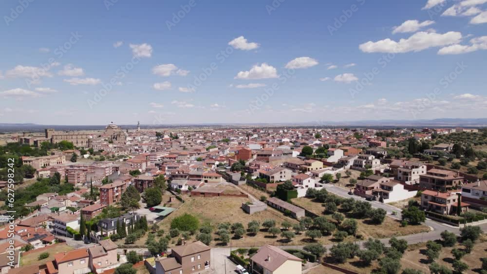 Aerial view flying across the residential district of Oropesa, Spanish town in the province of Toledo Aerial view flying across the residential district of Oropesa, Spanish town in the province of Toledo