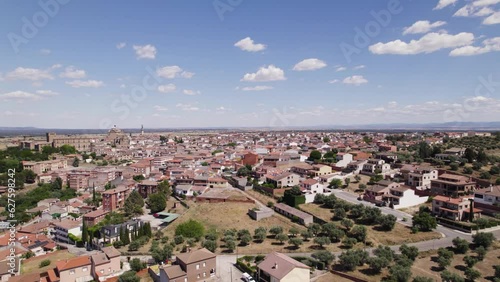 Aerial view flying across the residential district of Oropesa, Spanish town in the province of Toledo photo