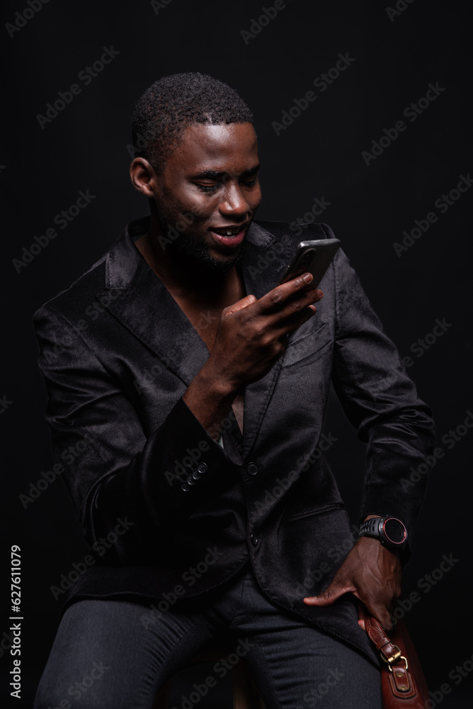 Black man browsing mobile phone Black man browsing mobile phone