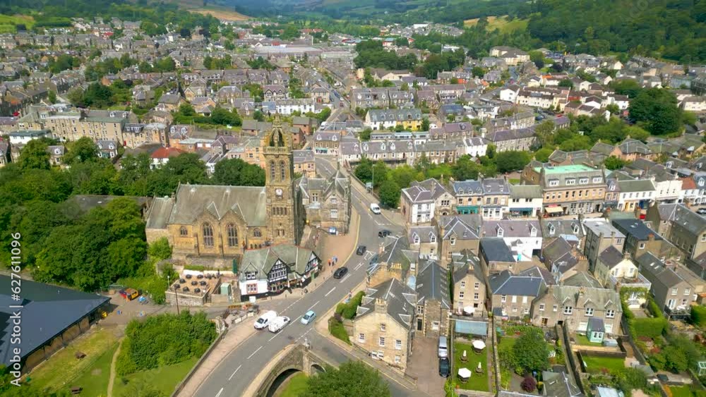 Aerial Drone shot of the town of Peebles in the Scottish Borders pulling back from Peebles Old Parish Church towards the Tweed Bridge. Aerial Drone shot of the town of Peebles in the Scottish Borders pulling back from Peebles Old Parish Church towards the Tweed Bridge.