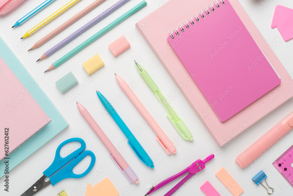 Flat lay with colorful school stationery on white backgroung, top view Flat lay with colorful school stationery on white backgroung, top view