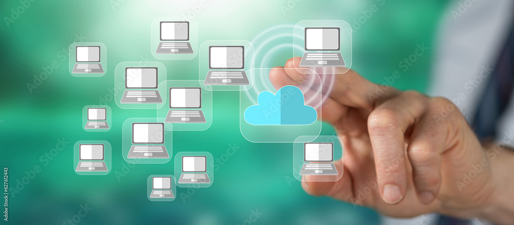 Man touching a cloud computing concept Man touching a cloud computing concept