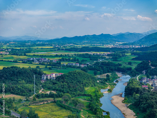 Overlook of Chinese rural houses and river scenery,Aerial photography of pastoral scenery in Jiangxi, China
