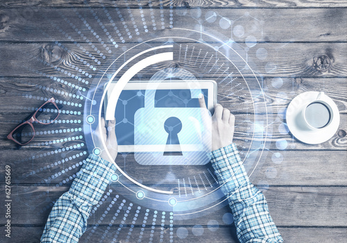 Concept of computer access with media lock icon on tablet screen