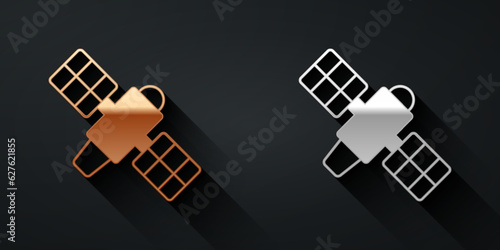 Gold and silver Satellite icon isolated on black background. Long shadow style. Vector