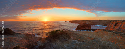 romantic sunset mood at costa vicentina cliffs near carrapateira