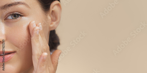Crop Photo of Cosmetics Skin Care Concept Photo of Close-up Woman Perfect Face with Hydrated Skin photo