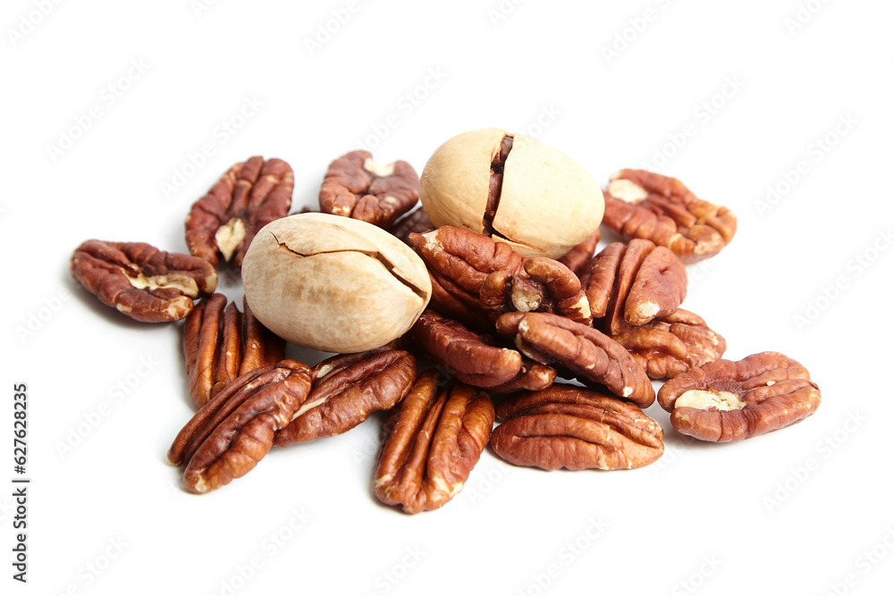 Pecan nuts in shell and peeled pecan kernels isolated on white background. Pecans boast a rich, buttery flavor with a hint of nuttiness Pecan nuts in shell and peeled pecan kernels isolated on white background. Pecans boast a rich, buttery flavor with a hint of nuttiness