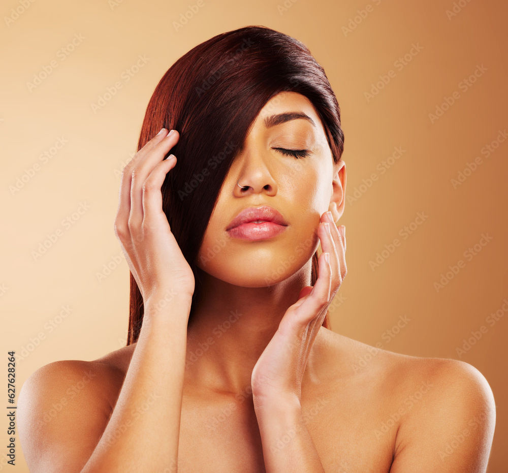 Hair care, beauty and a woman in studio for salon, hairdresser and wellness results. Self care, cosmetics and shampoo for growth and shine of an aesthetic model person on a brown background