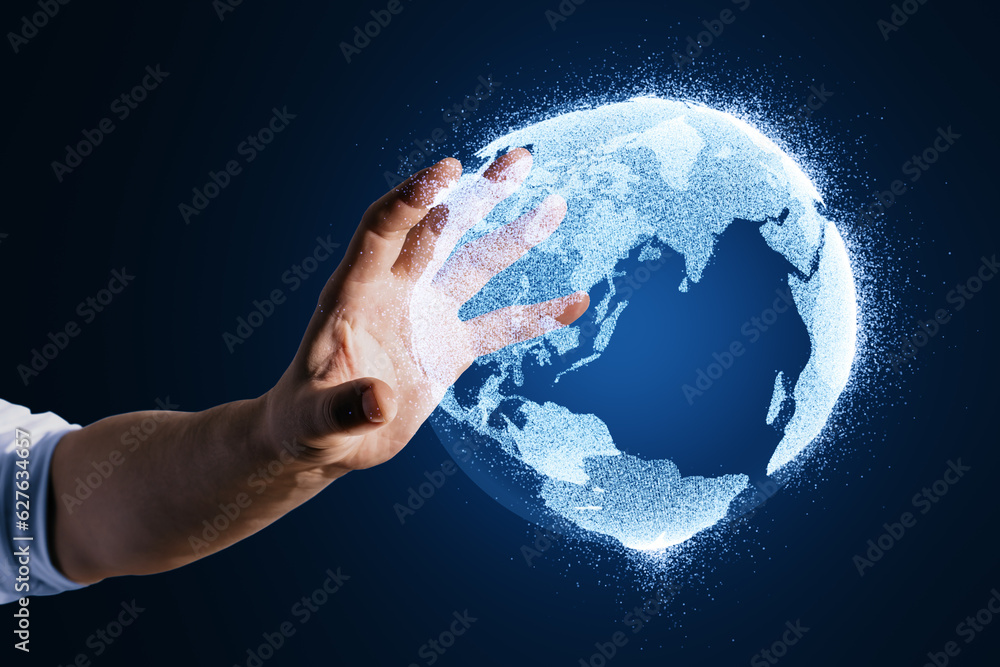 Close up of male hand using glowing globe hologram on blurry blue background. Digital earth and metaverse concept. Close up of male hand using glowing globe hologram on blurry blue background. Digital earth and metaverse concept.