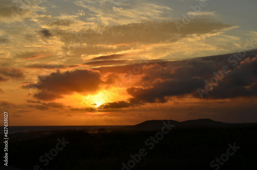 Golden Sunset Over the Coast in Aruba © dejavudesigns