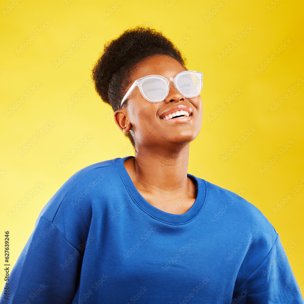 Happy, smile and glasses with face of black woman in studio for vision, eye care and confidence. Gen z, fashion and happiness with female person on yellow background for health and creative style Happy, smile and glasses with face of black woman in studio for vision, eye care and confidence. Gen z, fashion and happiness with female person on yellow background for health and creative style