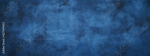 Background image of plaster texture in dark blue tones in grunge style