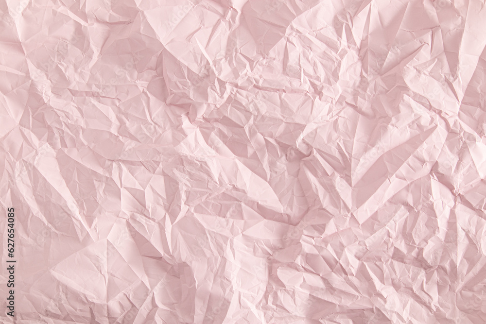 Delicate pink background of crumpled paper. paper abstract background. template, layout, product presentation