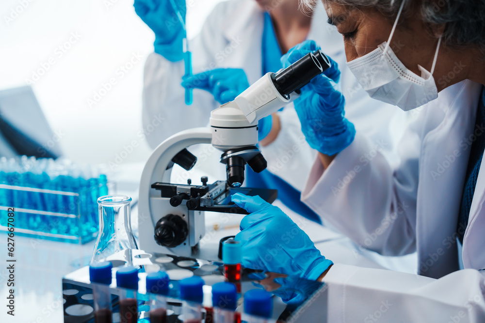 Health care researchers working in life science laboratory, Teaching in labs - Requiring students to record their laboratory methods and results as a running record of their laboratory work. Health care researchers working in life science laboratory, Teaching in labs - Requiring students to record their laboratory methods and results as a running record of their laboratory work.