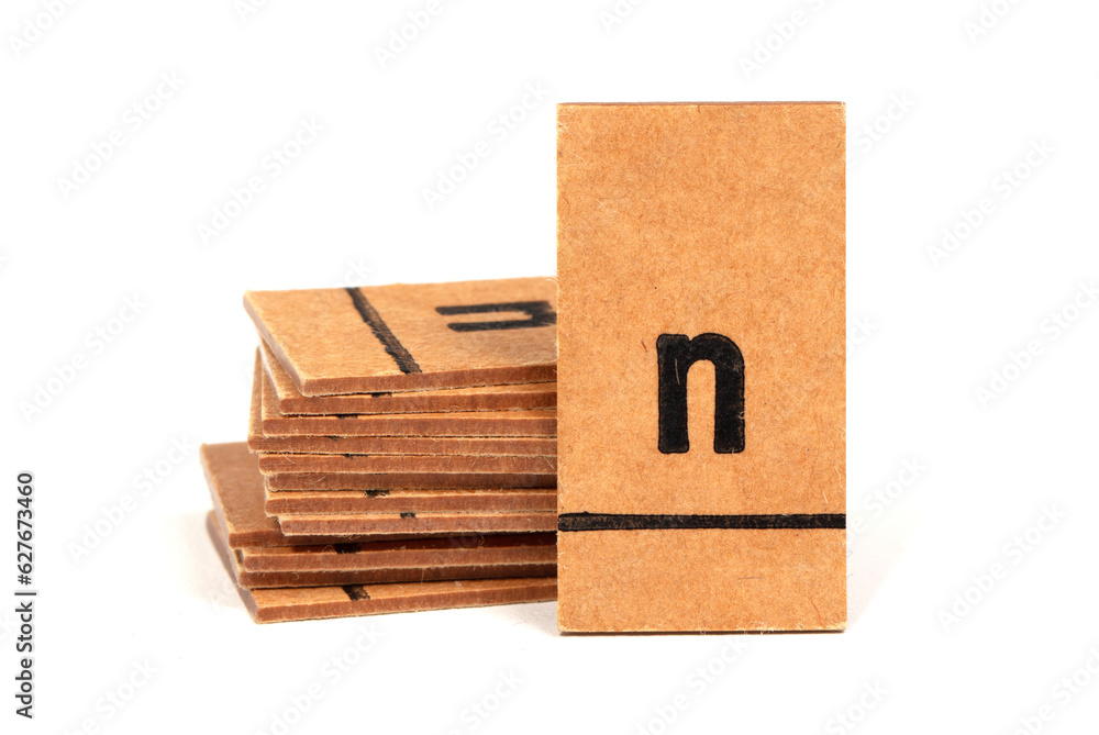 Stack of letters from a very old letterbox used to teach children - Letter n Stack of letters from a very old letterbox used to teach children - Letter n