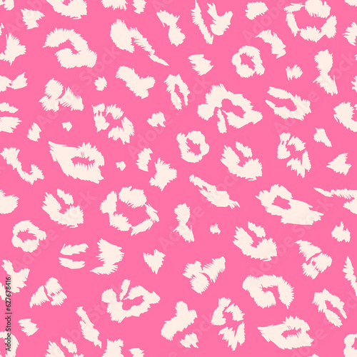 Pink lion skin texture. Leopard pattern seamless. A classic print that is suitable for printing on fabric, paper and more. Animal print for clothing, graphic design, packaging. Fashion leopard texture
