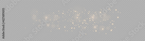 The light of gold dust. bokeh light effect background png. Christmas glowing dust background. Yellow flickering glow with confetti bokeh light and particle motion.