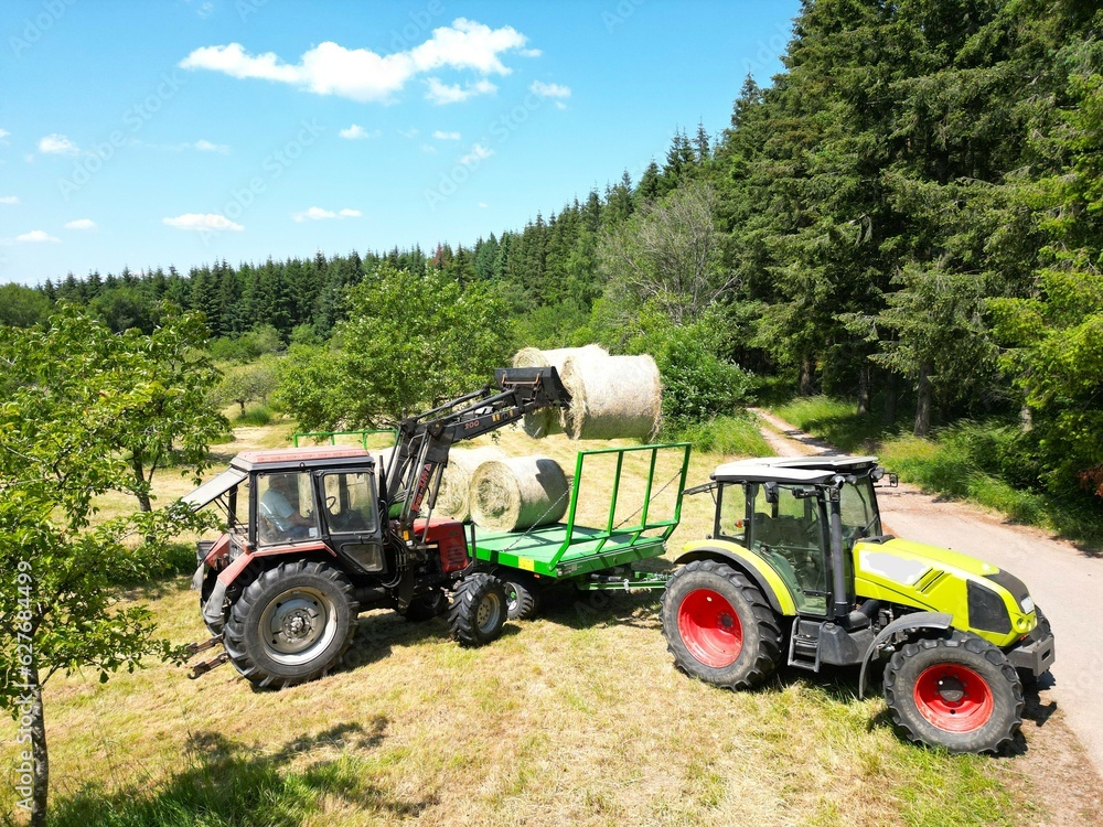 Working in the field on a tractor, harvesting Working in the field on a tractor, harvesting