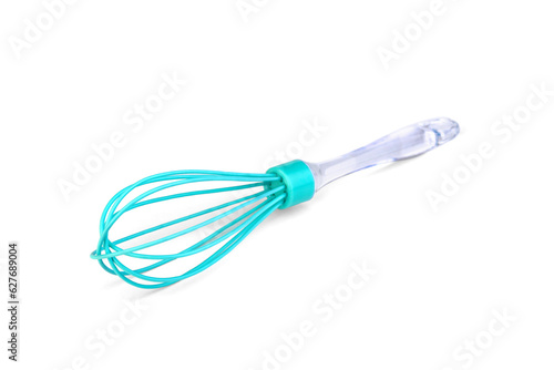 Green silicone whisk on a white background.