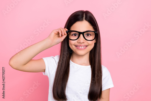 Canvas Print Photo portrait of pretty young child girl touch wear try eyeglasses dressed styl