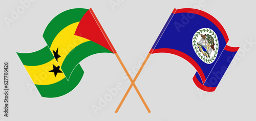 Crossed and waving flags of Sao Tome and Principe and Belize