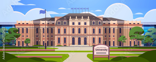 modern university or college building exterior view empty front yard with green grass and trees education