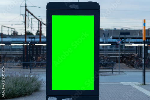 Quadro su tela Mockup - Commercial/public transport pylon with train station and bike parking i