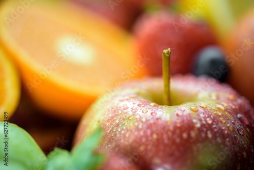 Fotografía Refreshing and Crisp: Close-Up of Washing a Fresh Apple in 4K Resolution