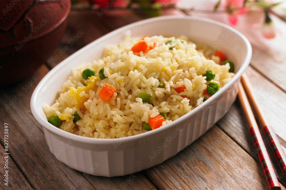 Satisfying Comfort: Close-Up of Chicken Fried Rice with Fresh Vegetables, Captured in 4K Resolution Satisfying Comfort: Close-Up of Chicken Fried Rice with Fresh Vegetables, Captured in 4K Resolution