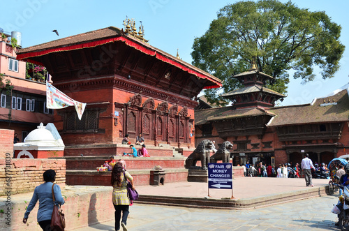 Life and lifestyle of nepali people walking travel visit ancient nepalese architecture and antique old ruin building at Basantapur Katmandu Durbar Square Kshetra on October 29, 2013 in Kathmandu Nepal photo