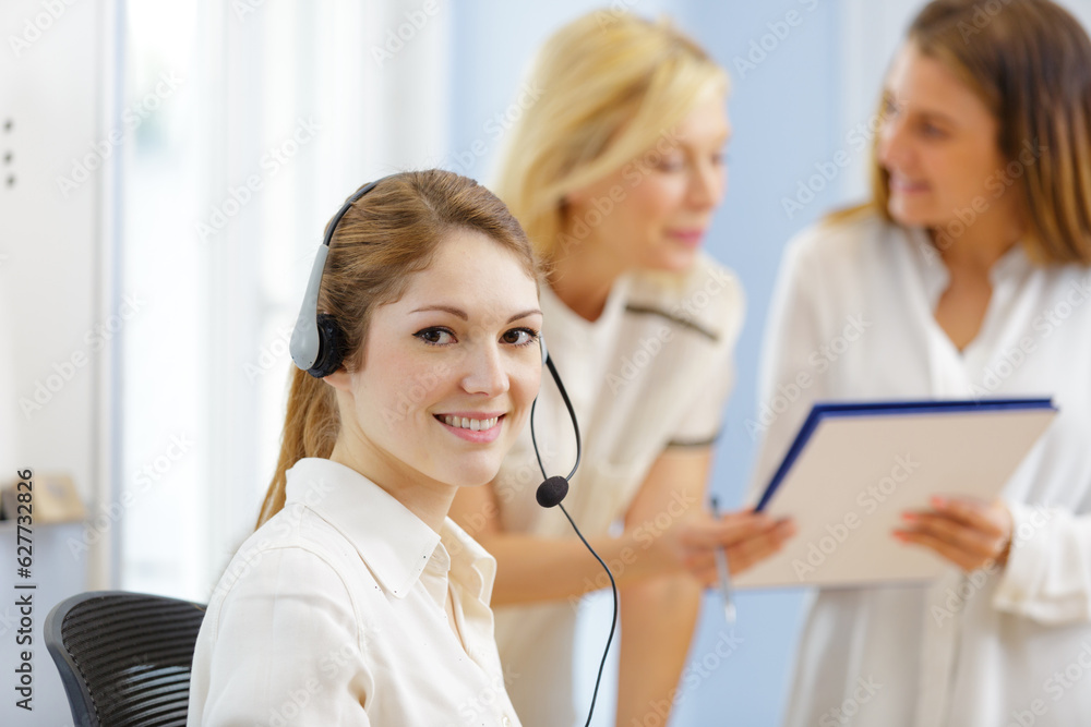 efficient smiling secretary answering phone calls efficient smiling secretary answering phone calls