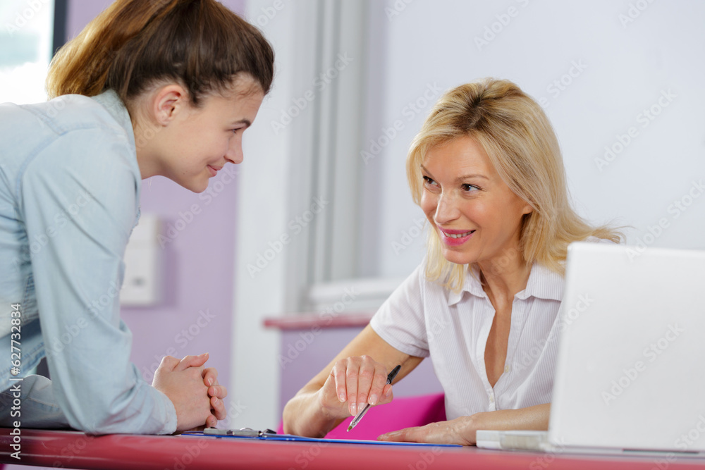 portrait of a student approaching the professor portrait of a student approaching the professor
