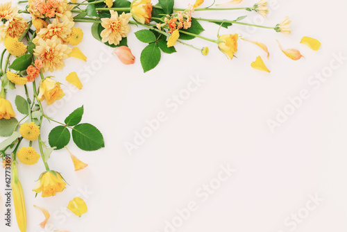 frame of beautiful flowers on white background